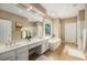 Spacious primary bathroom with double vanity, large tub, and glass shower at 2132 Wrights Mill Ne Cir, Atlanta, GA 30324