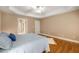 Neutral bedroom with hardwood floors and ensuite bathroom access at 2132 Wrights Mill Ne Cir, Atlanta, GA 30324