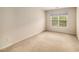 Carpeted bedroom featuring one window providing natural light at 2132 Wrights Mill Ne Cir, Atlanta, GA 30324