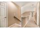 Upstairs hallway with neutral carpet and paint at 2132 Wrights Mill Ne Cir, Atlanta, GA 30324