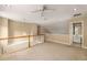 Loft area with ceiling fan and ensuite bathroom access at 2132 Wrights Mill Ne Cir, Atlanta, GA 30324