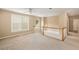 Second floor loft area with window and ceiling fan at 2132 Wrights Mill Ne Cir, Atlanta, GA 30324