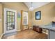 Bright breakfast nook with wood flooring, backyard access, and a countertop for easy eating at 47 Powder Springs St, Hiram, GA 30141
