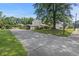 Long driveway leading to a carport, offering ample parking space and outdoor convenience at 47 Powder Springs St, Hiram, GA 30141
