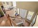 Bright foyer with a high ceiling, decorative railings and a large front door with sidelights at 47 Powder Springs St, Hiram, GA 30141
