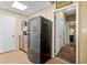 Kitchen area featuring cabinets, appliances, and an exterior door at 47 Powder Springs St, Hiram, GA 30141