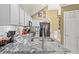 Stylish kitchen featuring stainless steel appliances, modern countertops and hardwood floors at 47 Powder Springs St, Hiram, GA 30141