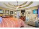 Cozy main bedroom with a ceiling fan, ensuite bathroom and neutral decor at 47 Powder Springs St, Hiram, GA 30141