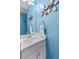 Stylish bathroom featuring a modern vanity with decorative floral accents at 520 Weatherend Ct, Johns Creek, GA 30022