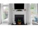Cozy fireplace with decorative mantel, perfect for relaxing and unwinding at 520 Weatherend Ct, Johns Creek, GA 30022