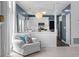 Open-concept kitchen features modern white cabinets and stainless steel appliances at 520 Weatherend Ct, Johns Creek, GA 30022