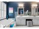 Spacious bathroom featuring a large soaking tub, dual vanities, and modern tile accents for spa-like relaxation at 520 Weatherend Ct, Johns Creek, GA 30022
