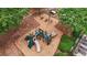 Community playground and picnic area surrounded by lush landscaping at 520 Weatherend Ct, Johns Creek, GA 30022
