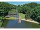 Scenic aerial view of neighborhood lake at 1155 Graystone Xing, Alpharetta, GA 30005
