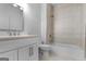 Neutral bathroom with white cabinet, vanity and shower-tub combo at 1155 Graystone Xing, Alpharetta, GA 30005
