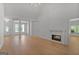 Large, open living room with tall ceilings, wood floors, and lots of space at 1155 Graystone Xing, Alpharetta, GA 30005