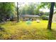 This backyard offers a play area and a storage shed at 3854 Bright Star Road, Douglasville, GA 30135
