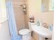 This bathroom offers a shower with blue shower curtain at 3854 Bright Star Road, Douglasville, GA 30135