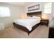 This bedroom features a bed, nightstand, and decor at 3854 Bright Star Road, Douglasville, GA 30135