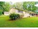 Single Gathering home with manicured lawn and a covered porch at 3854 Bright Star Road, Douglasville, GA 30135