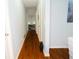 Hallway features sleek hardwood floors and neutral colored walls at 3854 Bright Star Road, Douglasville, GA 30135