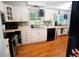 Updated kitchen with white cabinetry, stainless steel appliances, and hardwood floors at 3854 Bright Star Road, Douglasville, GA 30135