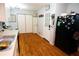 Kitchen with stainless steel sink, storage, and black refrigerator at 3854 Bright Star Road, Douglasville, GA 30135