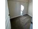 Walk-in closet with carpet, wire shelving, and a simple lighting fixture at 3867 Lockaby Way, Lawrenceville, GA 30044