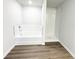 Bathroom with tub and shower with white subway tile at 5443 Belle Meade Dr, Villa Rica, GA 30180