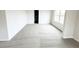 Spacious bedroom with neutral carpet, bright light, and an ensuite bathroom at 5443 Belle Meade Dr, Villa Rica, GA 30180