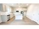 Bright kitchen features an island, stainless steel appliances, and granite countertops at 5443 Belle Meade Dr, Villa Rica, GA 30180