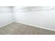 An empty walk-in closet with carpeted floor and wire shelving at 5443 Belle Meade Dr, Villa Rica, GA 30180