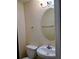 Bathroom with an oval mirror and a single sink vanity at 6398 Shadow Sq, Lithonia, GA 30058