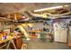 Unfinished basement area with exposed ceiling features and shelving provides ample storage space at 80 Broadlands Dr, White, GA 30184