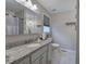 Bathroom with updated granite countertops, modern fixtures, and neutral colors at 80 Broadlands Dr, White, GA 30184