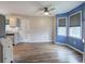 Bright dining area with blue walls, lots of windows, and ceiling fan at 80 Broadlands Dr, White, GA 30184