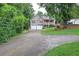 Charming home with two-car garage, covered front porch, and beautiful landscaping at 80 Broadlands Dr, White, GA 30184