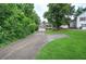 Charming home with a two-car garage, front porch and well-manicured lawn is situated on a tree-lined lot at 80 Broadlands Dr, White, GA 30184