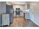 Updated kitchen with stainless steel appliances and granite countertops at 80 Broadlands Dr, White, GA 30184