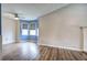 Bright living room featuring a ceiling fan and corner windows at 80 Broadlands Dr, White, GA 30184