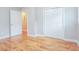 Bright bedroom with hardwood floors and a spacious closet at 101 Longstreet Cir, Oxford, GA 30054