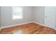 Cozy bedroom with hardwood floors and natural light at 101 Longstreet Cir, Oxford, GA 30054
