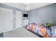 Inviting bedroom featuring a cozy bed, ample closet space, and a modern dresser, offering comfort and functionality at 173 Cline Smith Ne Rd, Cartersville, GA 30121