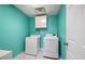 Functional laundry room with a modern washer and dryer set, offering convenience for household chores at 173 Cline Smith Ne Rd, Cartersville, GA 30121