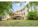 Large backyard with a shed and both screened and open porches at 2056 Plantation Rd, Lawrenceville, GA 30044