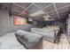 Finished basement with dark ceiling and potential home movie theater at 2056 Plantation Rd, Lawrenceville, GA 30044