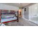 Bedroom with wooden bunk beds and carpet at 2056 Plantation Rd, Lawrenceville, GA 30044
