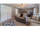A room with a ceiling fan and a view of a bed at 2056 Plantation Rd, Lawrenceville, GA 30044