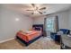 Bedroom with blue walls, plush carpet, and modern decor at 2056 Plantation Rd, Lawrenceville, GA 30044