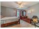 Cozy bedroom with dark wood dresser and carpet at 2056 Plantation Rd, Lawrenceville, GA 30044